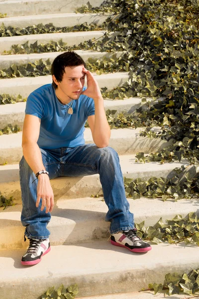 Young guy in thoughtful attitude — Stock Photo, Image