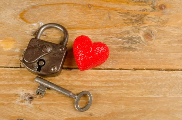 Lock and key to a heart — Stock Photo, Image