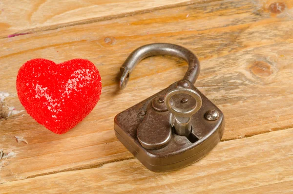 Lock and key to a heart — Stock Photo, Image