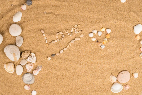 Liefde bericht op zand — Stockfoto