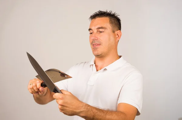 Man with kitchen knives — Stock Photo, Image