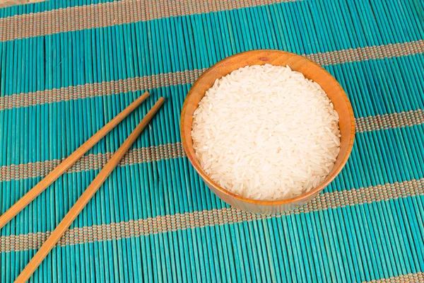 Rijst en eetstokjes — Stockfoto