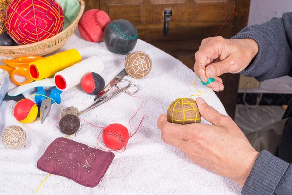 Male hand sewing — Stock Photo, Image