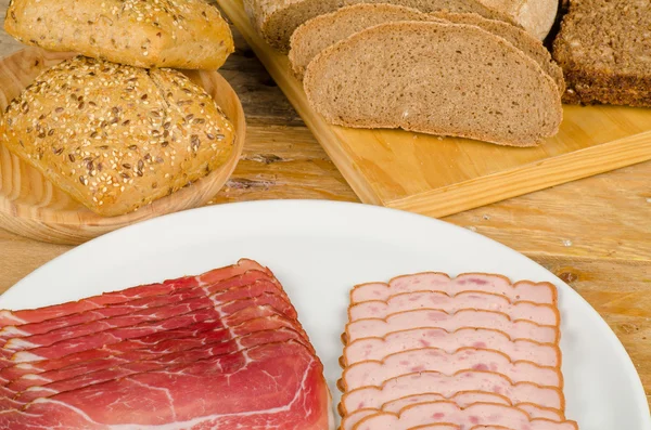 Cold meat and bread — Stock Photo, Image