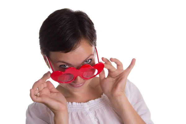 Surprised woman with funny glasses heart-shaped Royalty Free Stock Images