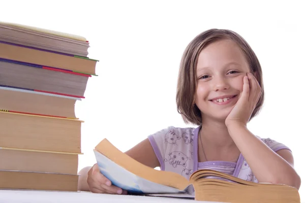 Souriante fille avec pile de livres — Photo