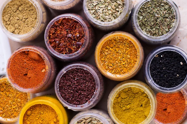 Assorted spices in containers — Stock Photo, Image