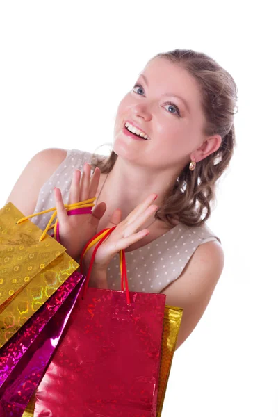 Mujer asombrada con bolsas de compras — Foto de Stock