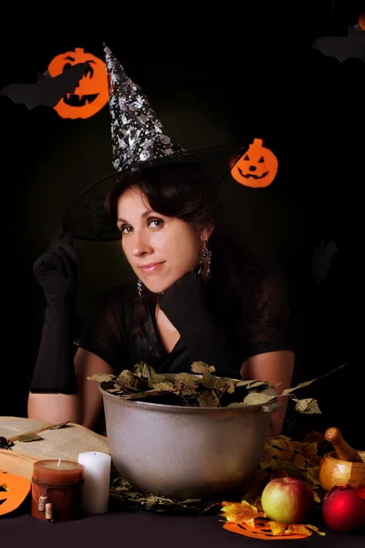 Witch practicing sorcery at Halloween night — Stock Photo, Image