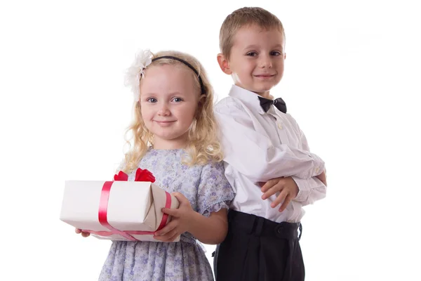 Smiling boy and girl with present box — Stock Photo, Image