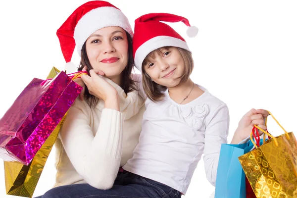 Gelukkig moeder en dochter op het winkelen van Kerstmis — Stockfoto