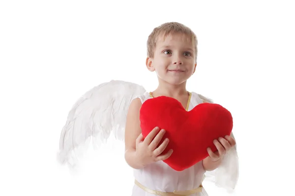 Schattige lachende cupid met hart in handen — Stockfoto