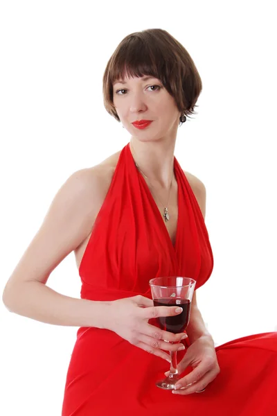 Elegante Frau im Kleid mit rotem Glas Wein — Stockfoto