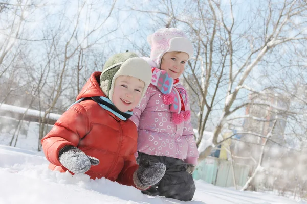 Children having fun in snow — Stock Photo, Image