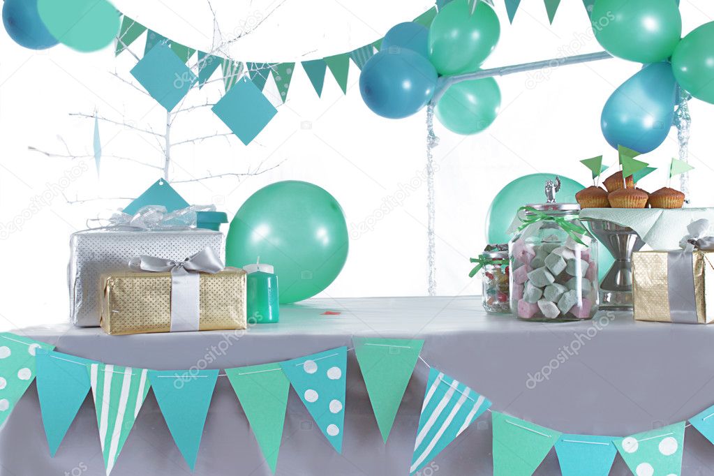 Blue and green colored birthday party table