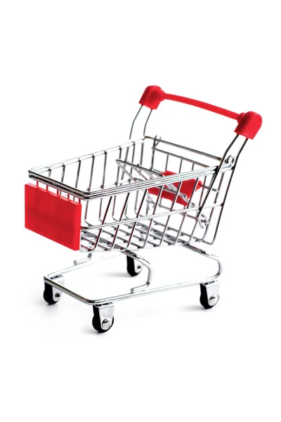 Pequeño carrito de compras rojo aislado — Foto de Stock