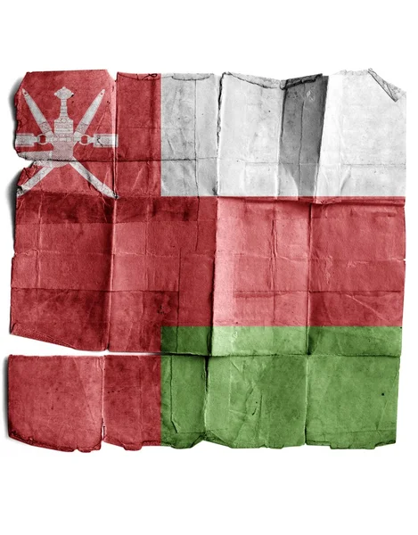 Vlajka Ománu na starý papír. — ストック写真
