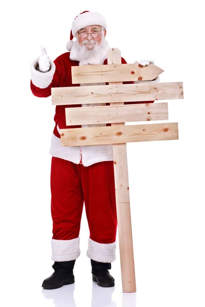 Weihnachtsmann mit Holzschild — Stockfoto