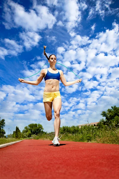 Jumping rope, exercising — Stock Photo, Image