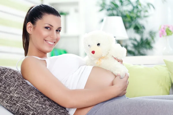 Pregnancy with teddy bear — Stock Photo, Image
