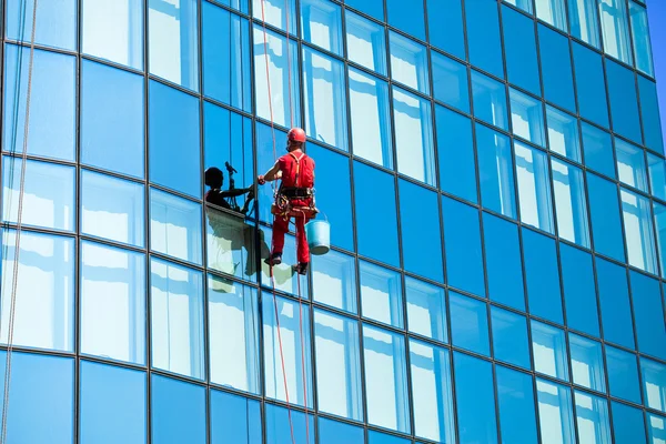 Washer wash the windows — Stock Photo, Image