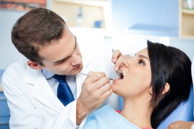 dentists assistant preparing patient
