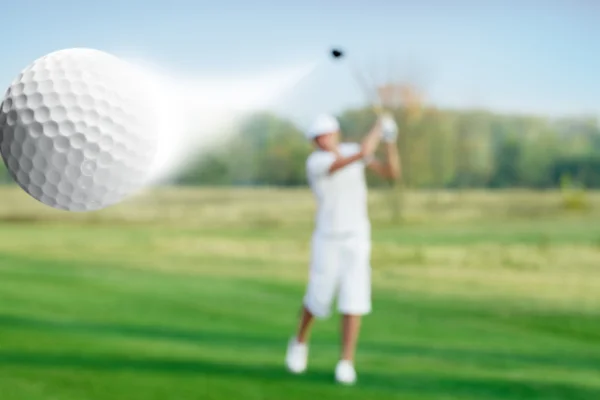 Golfer and golf ball — Stock Photo, Image