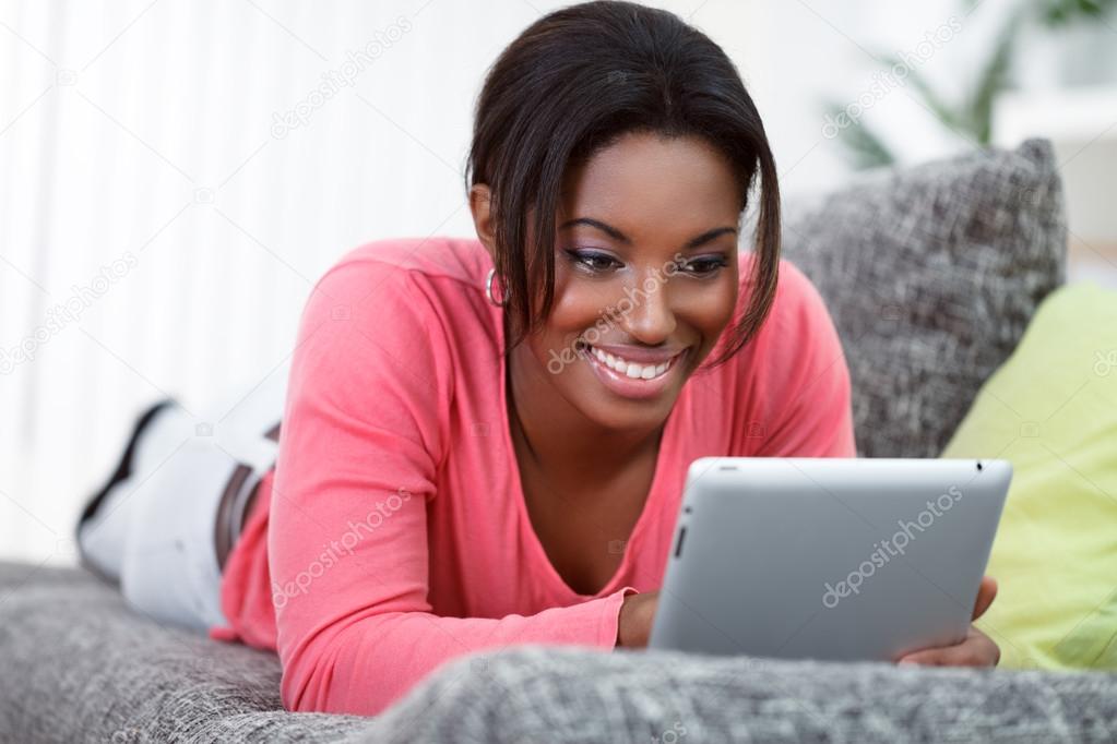 African young woman with tablet