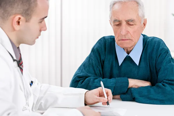 Doctor with senior patient Stock Image