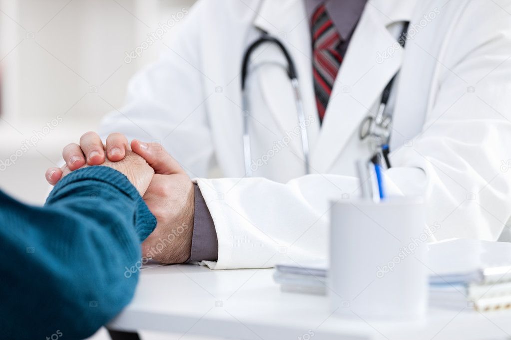 doctor comforting patient