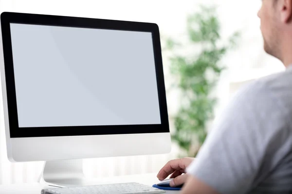 Young man working on computer — Stock Photo, Image