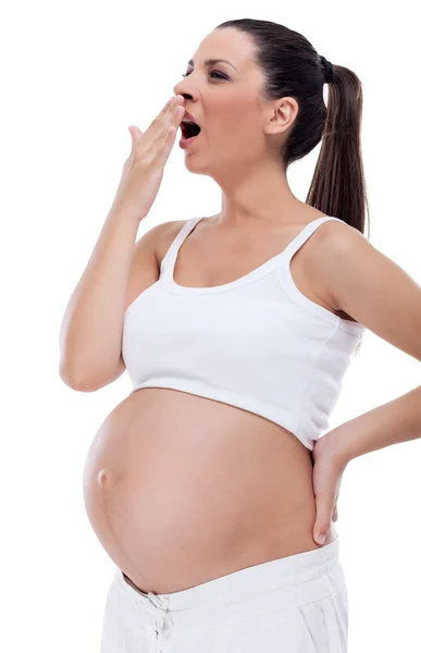 Zwangere vrouw geeuwen — Stockfoto