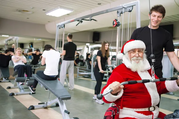 Papai Noel exercendo — Fotografia de Stock