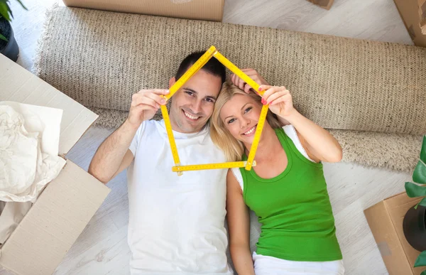 Happy couple in new home — Stock Photo, Image