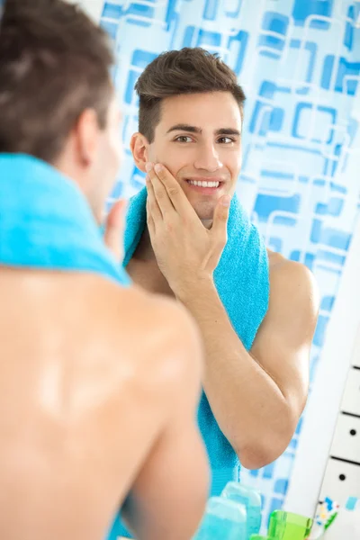 Satisfied handsome man aftershave — Stock Photo, Image