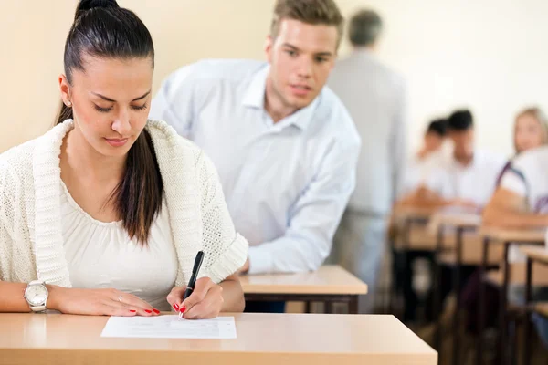 Student trying to cheat at test Royalty Free Stock Photos