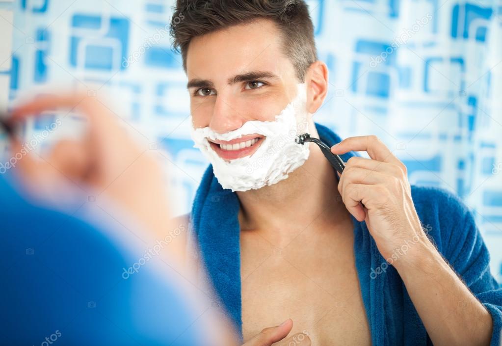 Sexy man shaving