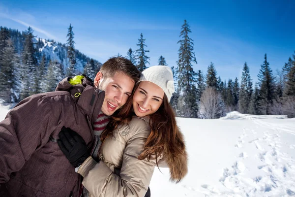 Affectionate winter couple — Stock Photo, Image