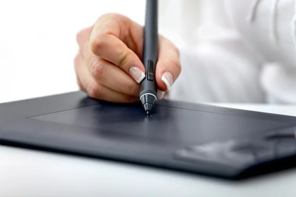 Digital graphics tablet and a hand — Stock Photo, Image