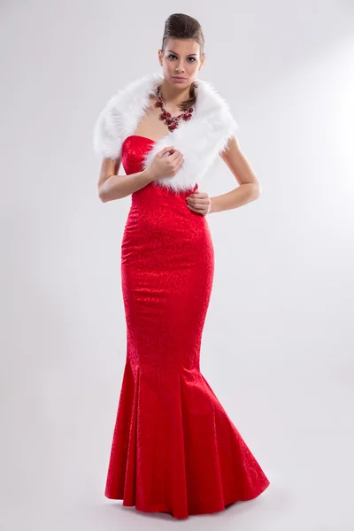 Glamorous woman in red long dress — Stock Photo, Image