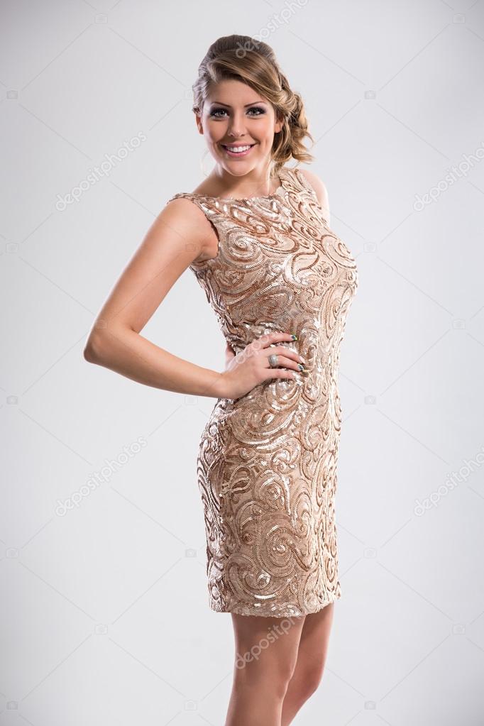 Attractive woman in sequin dress