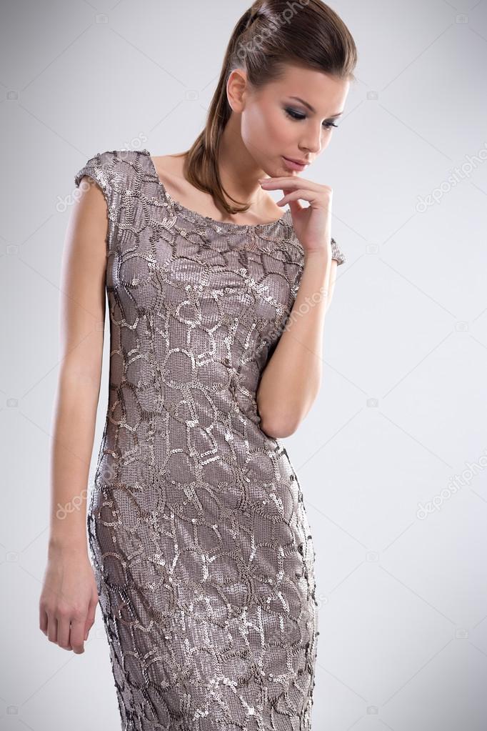 Fashionable woman in stylish dress