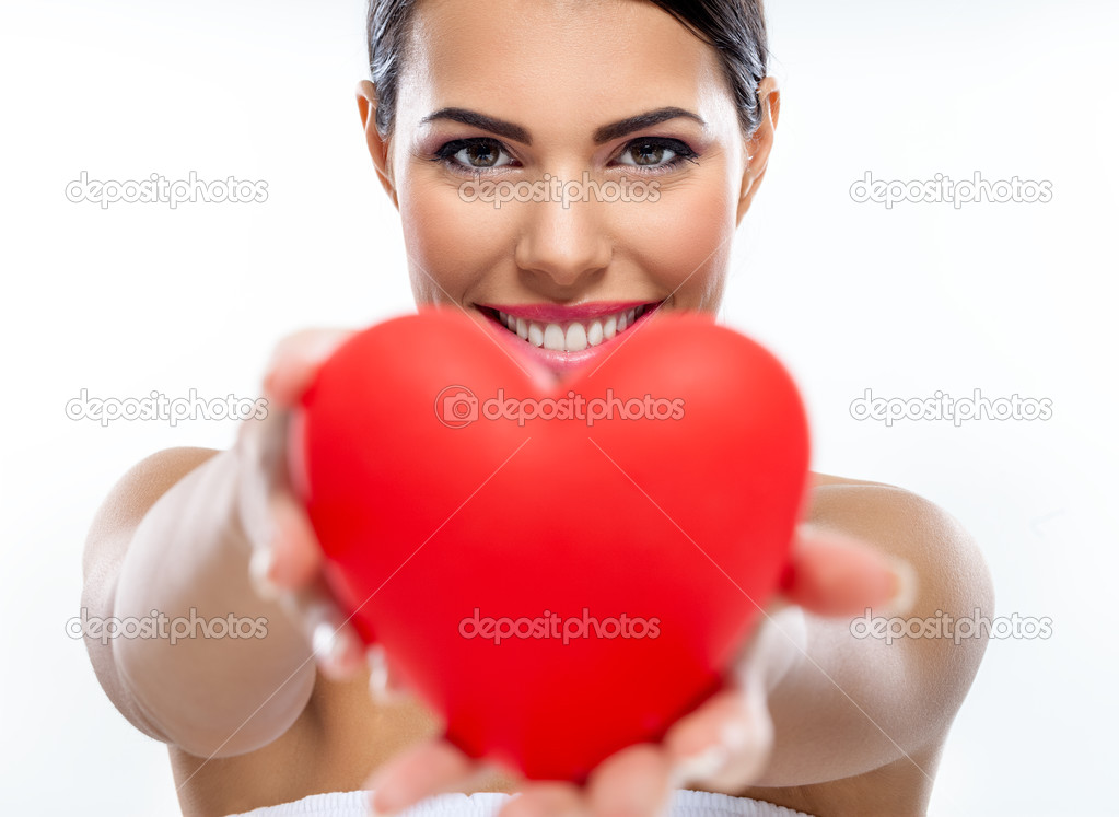 Woman giving heart