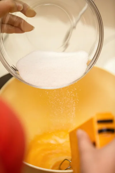 Whipping and adding sugar — Stock Photo, Image