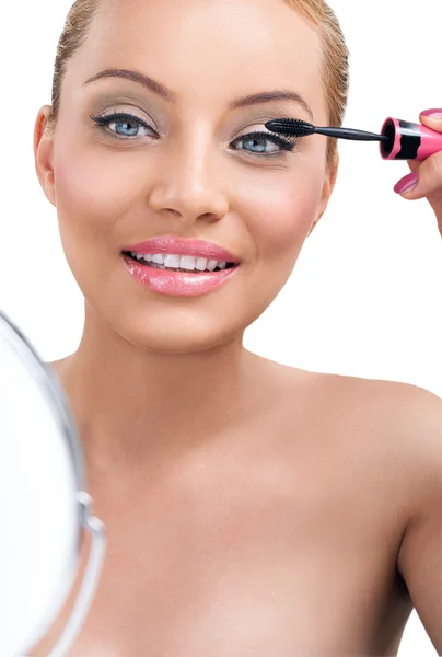 Make-up, použití řasenky Stock Snímky