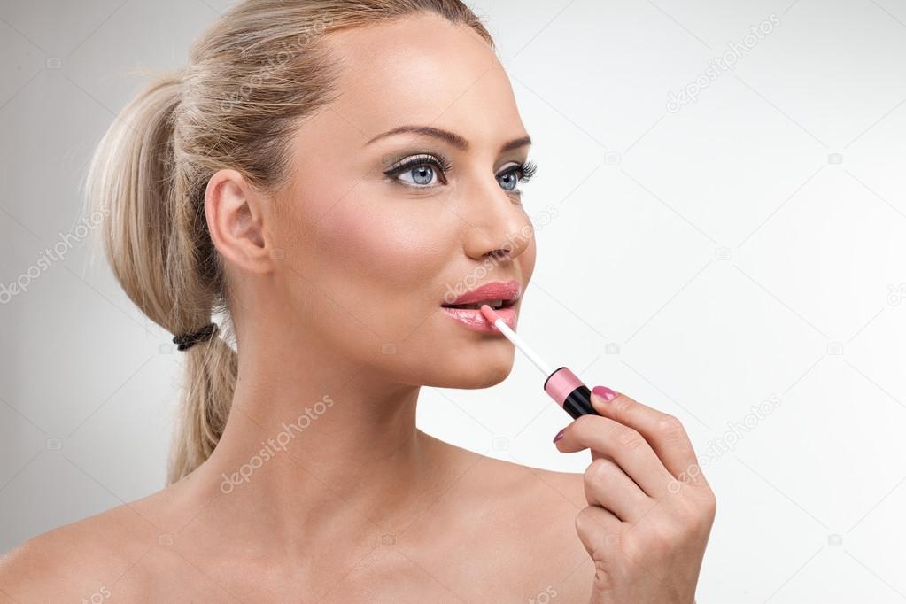 Woman with lip gloss