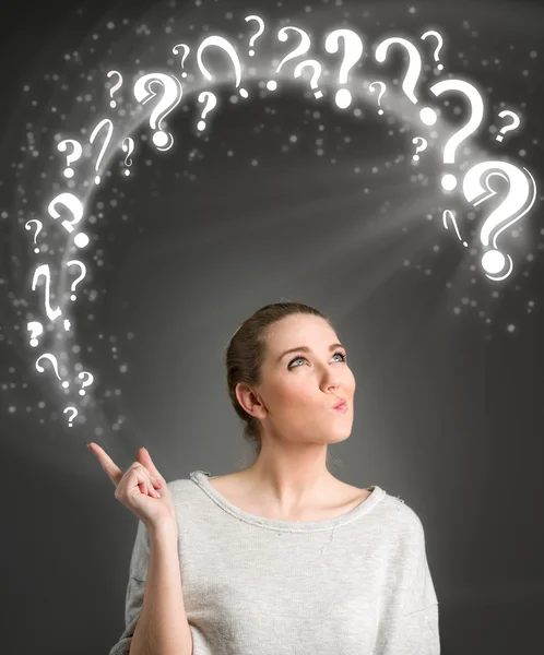 Thinking woman questions symbol — Stock Photo, Image