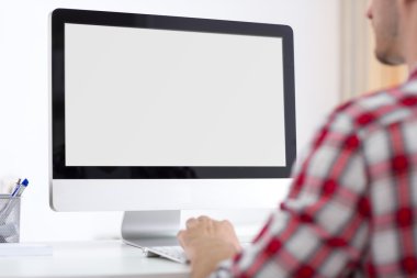 Person front of computer monitor