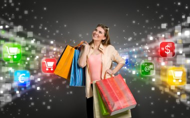 shopping woman surrounded by icons of e-commerce