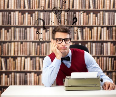Old fashioned writer with question marks over head clipart